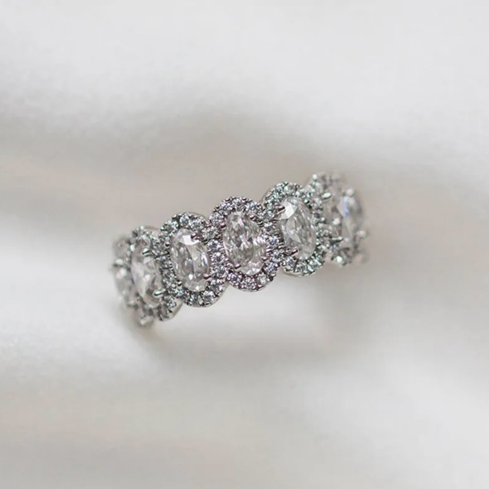 Luxurious Halo Oval Cut Wedding Band For Women In Sterling Silver